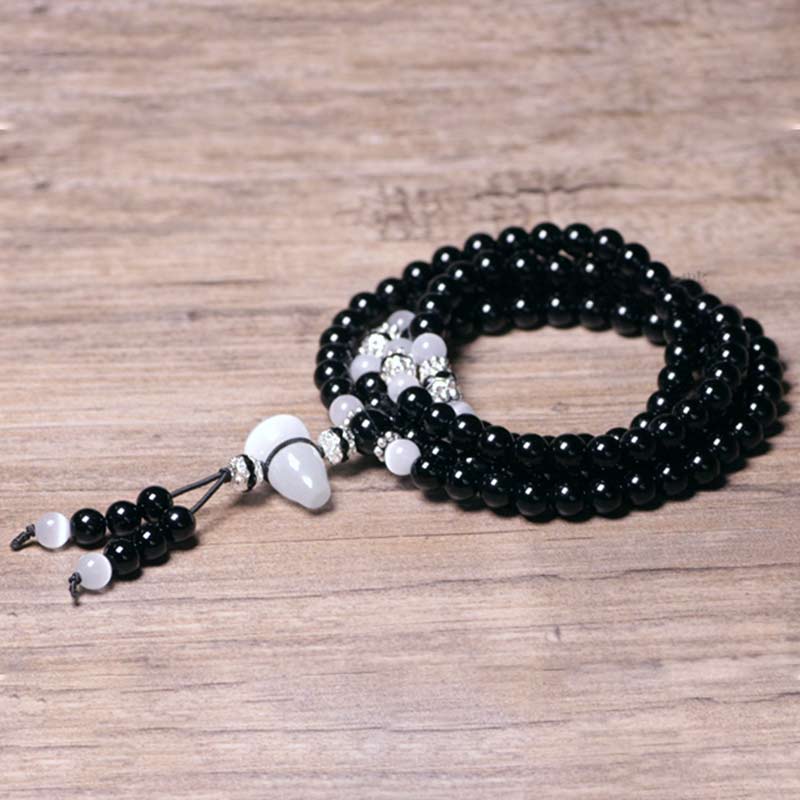 Pulsera de meditación con cuentas de cristal blanco de ónix negro