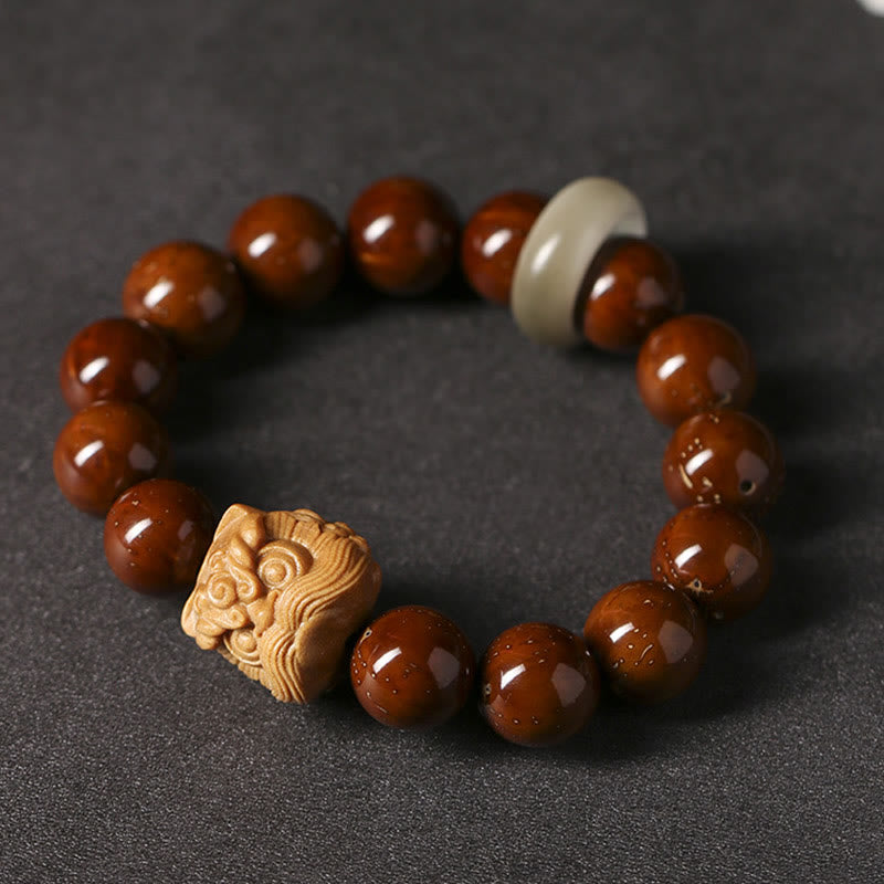 Pulsera de sabiduría de león danzante con semillas de Bodhi moradas con Buddha Stones