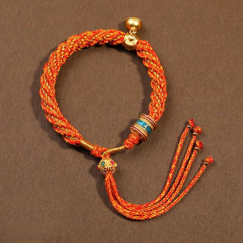 Pulsera de cuerda trenzada con dije de campana y rueda de oración Thangka de protección de la suerte hecha a mano tibetana
