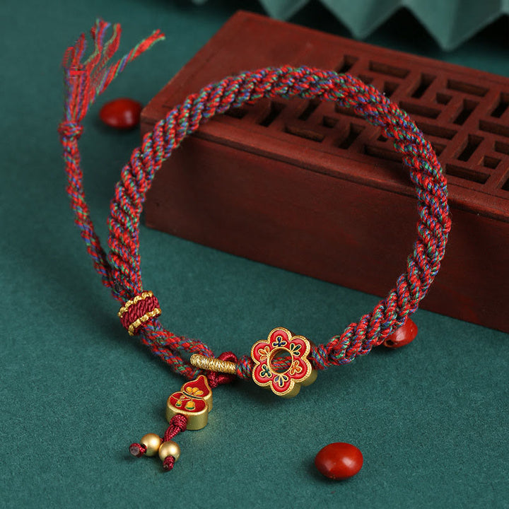 Pulsera de hilo trenzado con protección de flores de calabaza colorida hecha a mano con Buddha Stones