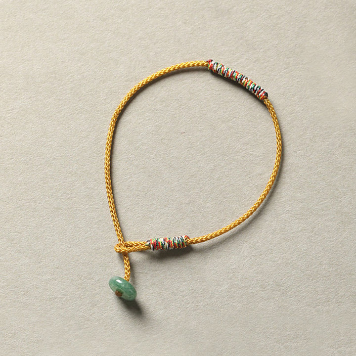 Pulsera de cuerda trenzada de protección de la suerte de aventurina verde hecha a mano tibetana con Buddha Stones