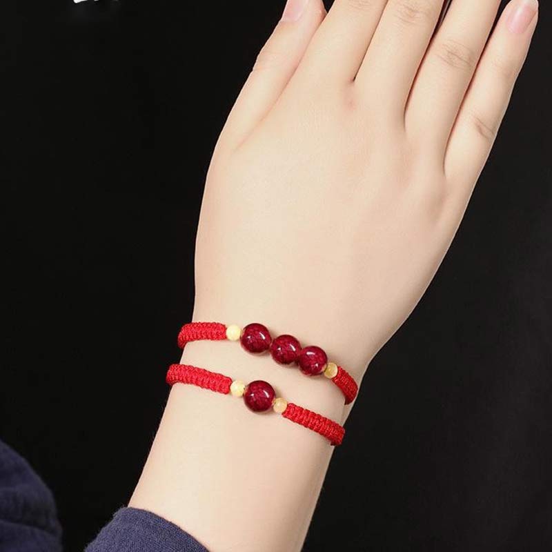 Pulsera de hilo rojo con bendición de cinabrio de Buddha Stones para niños