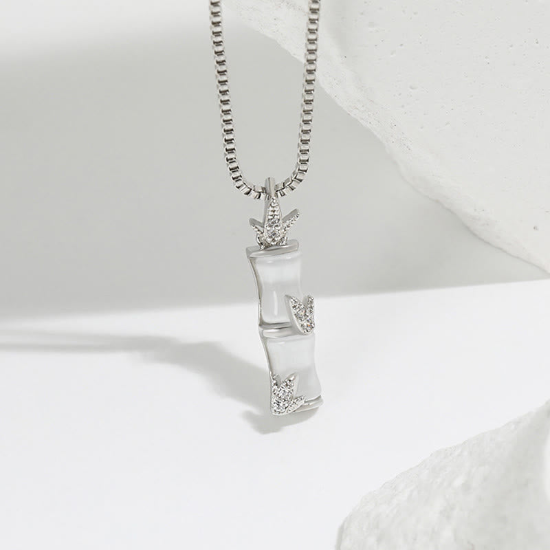 Colgante de collar de armonía con patrón de bambú de calcedonia de Buddha Stones