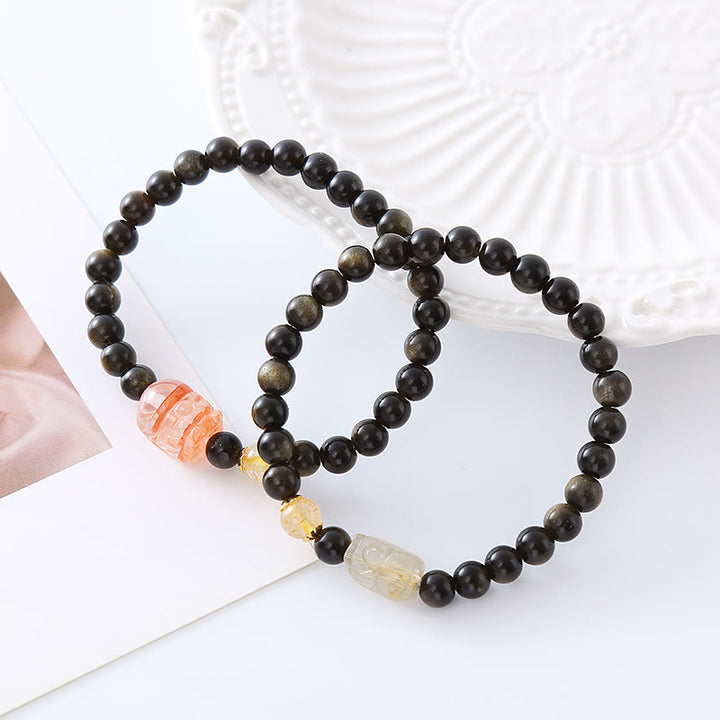 Pulsera de protección de la riqueza PiXiu de obsidiana con brillo de oro natural de Buddha Stones - image 0