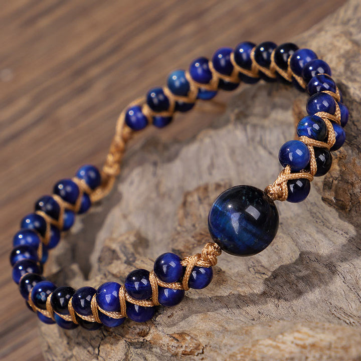 Pulsera de protección con piedra de ojo de tigre azul divino de Buddha Stones