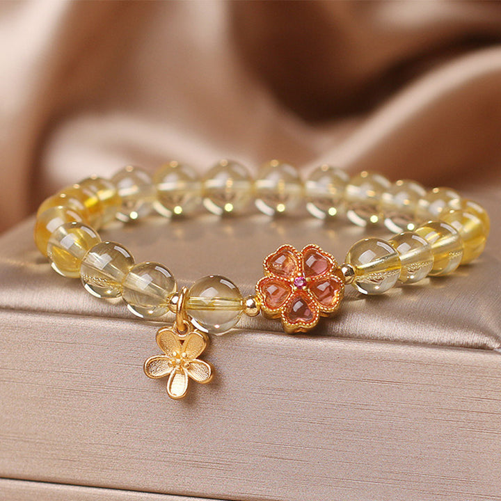 Pulsera de protección de prosperidad con dije de flor de citrino natural con Buddha Stones