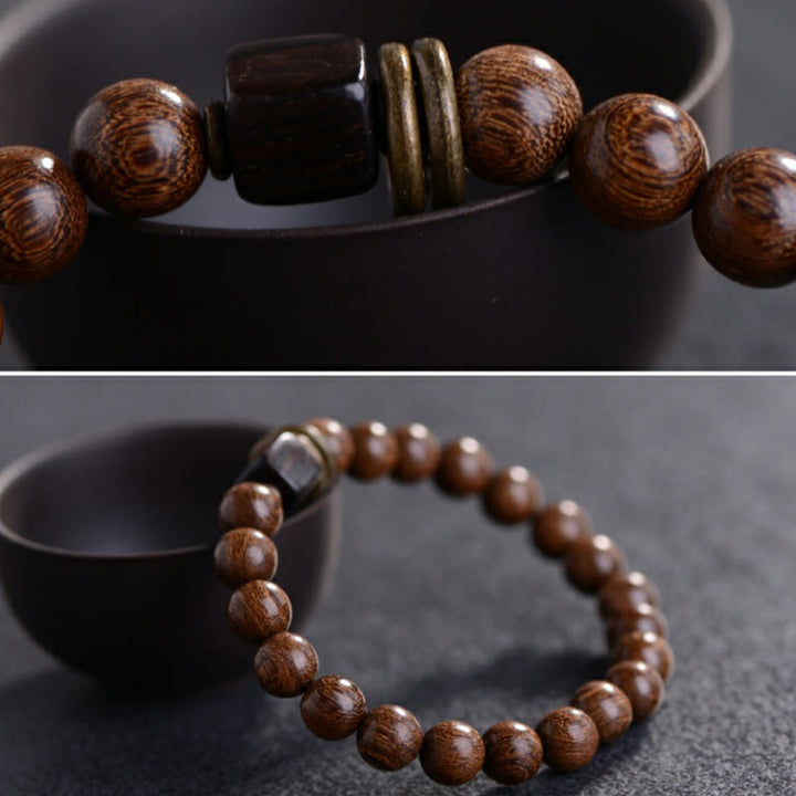 Pulsera de espiritualidad de madera de Phoebe Zhennan con Buddha Stones
