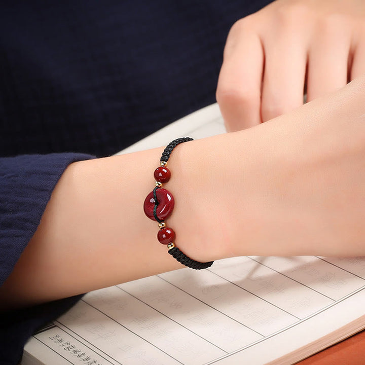 Pulsera de cuerda de bendición con hebilla de paz de cinabrio natural con Buddha Stones