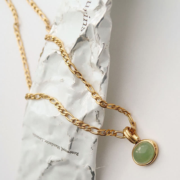 Colgante de collar de acero de titanio de fuerza turquesa ovalada