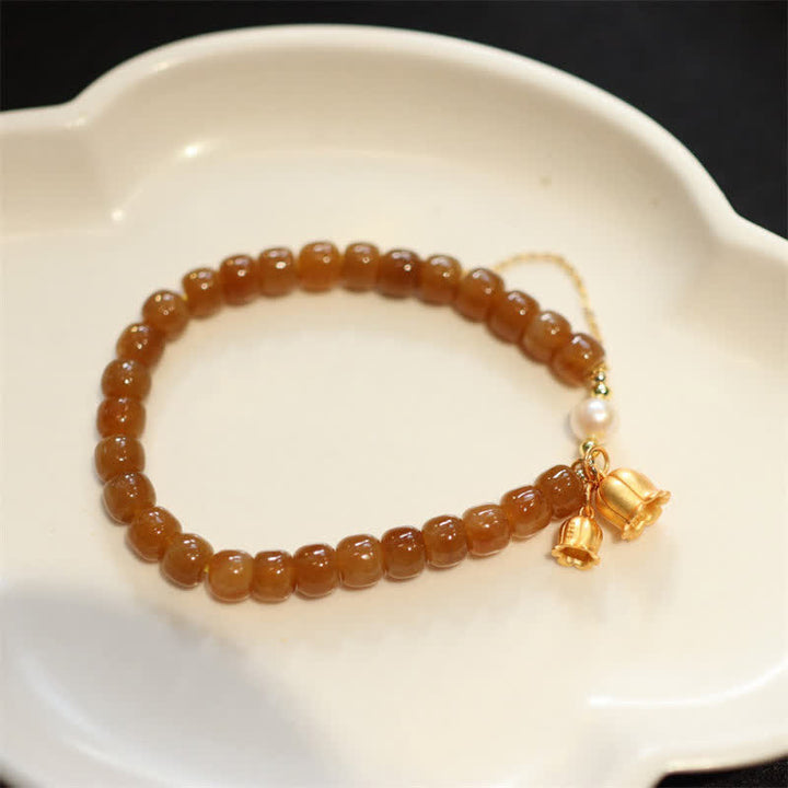 Pulsera con dije de lirio de los valles de jade hetiano natural de plata de ley 925