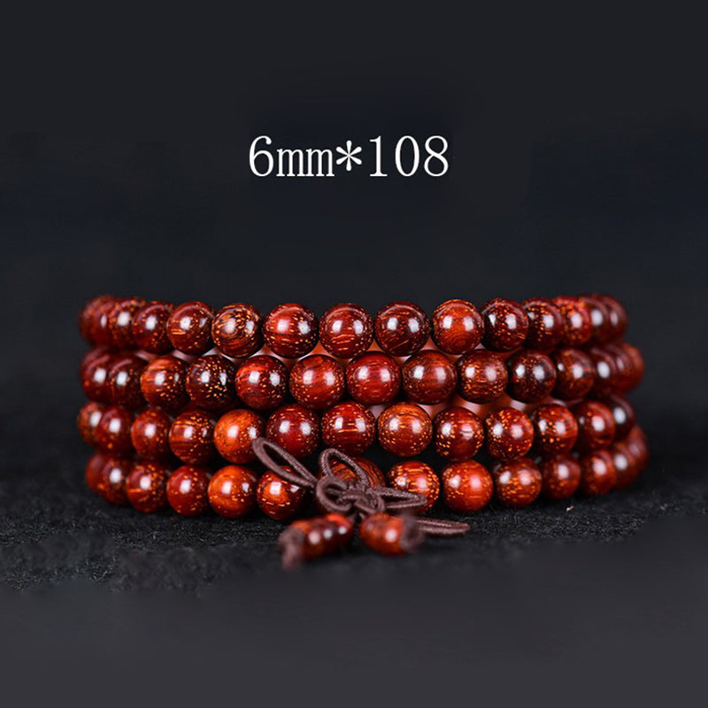 Pulsera de equilibrio de sándalo rojo con hoja pequeña tibetana de Buddha Stones