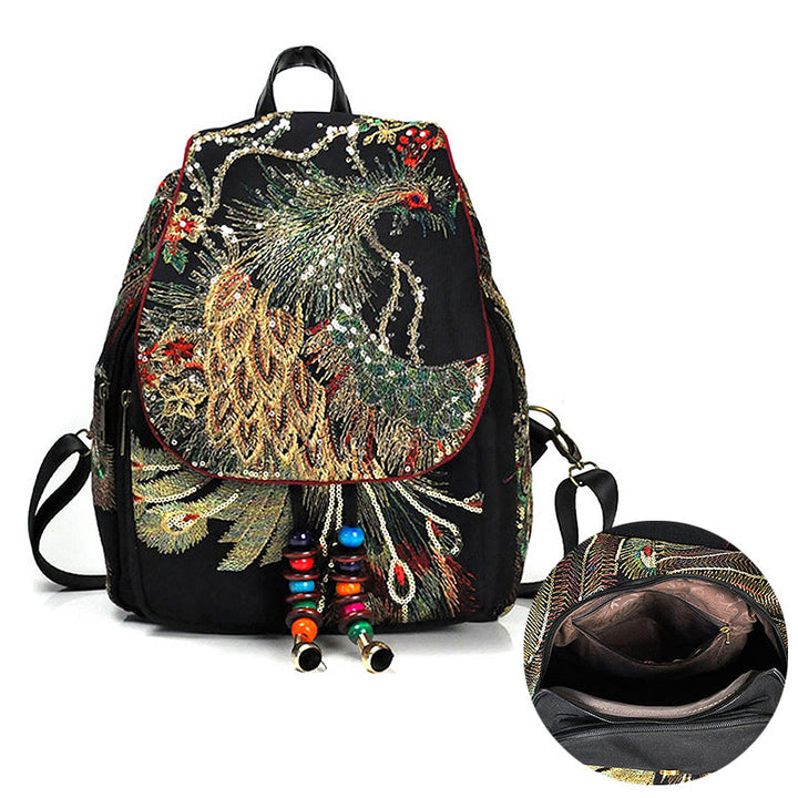 Mochila con borlas de lona con bordado de pavo real