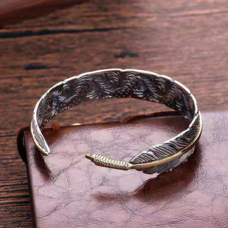 Brazalete con diseño de plumas y Buddha Stones, pulsera tallada de la suerte y la riqueza