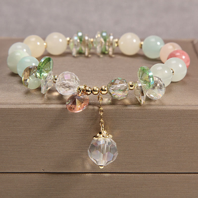 Pulsera con dije de paz y cristal rosa con ojo de gato y Buddha Stones