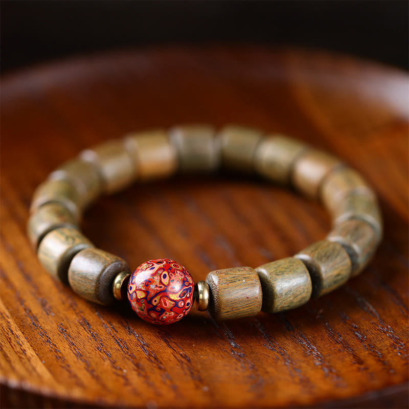 Pulsera de la paz con cuentas de laca de sándalo rojo de hoja pequeña de sándalo verde natural con Buddha Stones