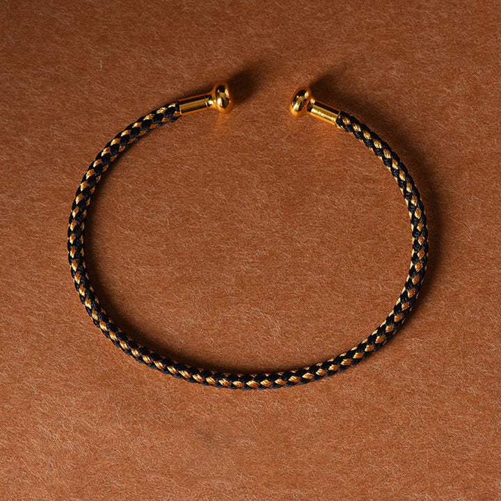 Pulsera de cuerda trenzada de la suerte hecha a mano con diseño simple de Buddha Stones