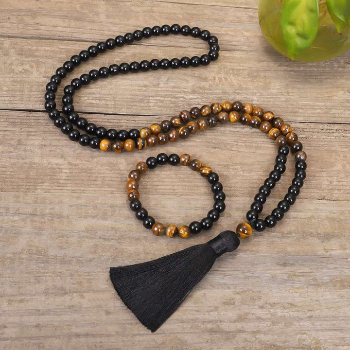 Juego de collar de protección de ojo de tigre de ónix negro tibetano con Buddha Stones