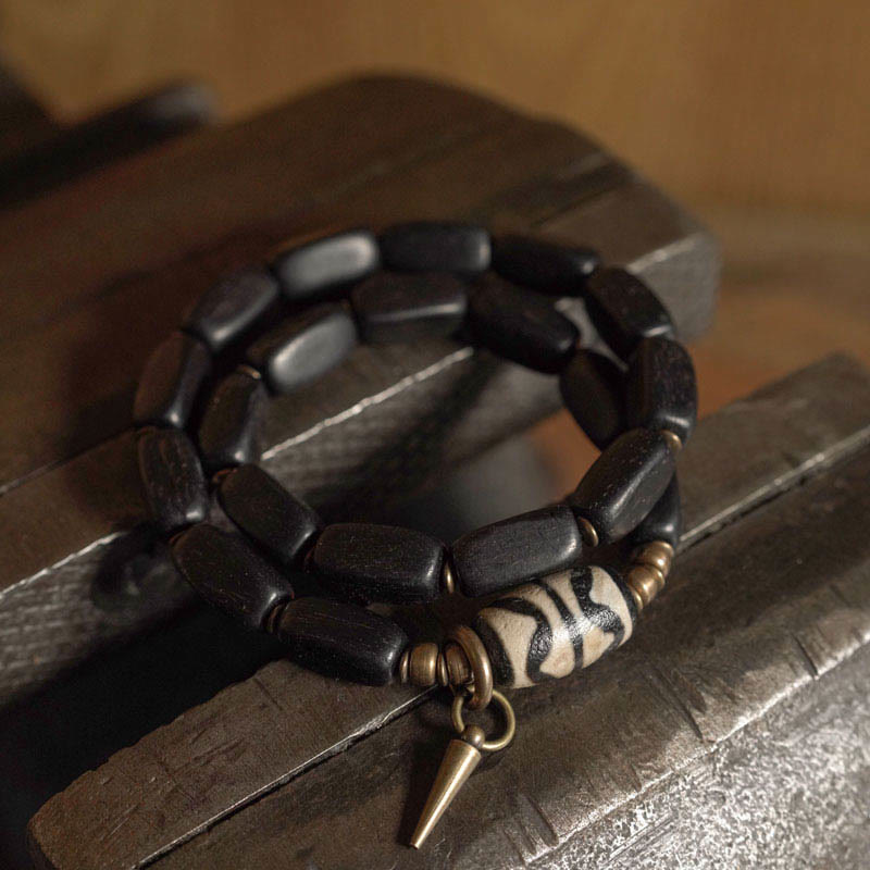Pulsera de doble envoltura con cuentas Dzi de madera de ébano del Tíbet con Buddha Stones