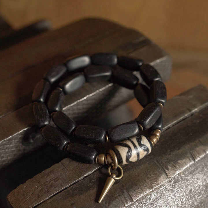 Pulsera de doble envoltura con cuentas Dzi de madera de ébano del Tíbet con Buddha Stones