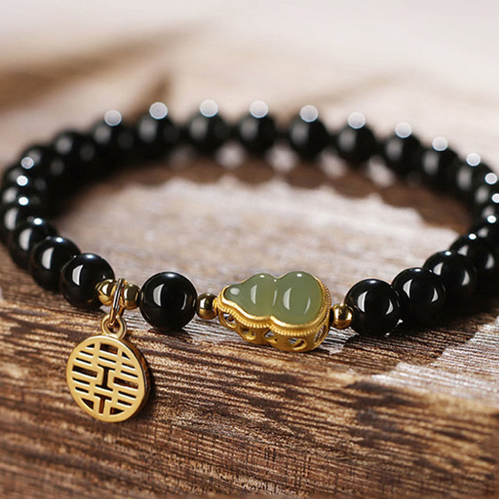 Pulsera de fuerza de doble felicidad con calabaza de jade hetiano de obsidiana negra natural