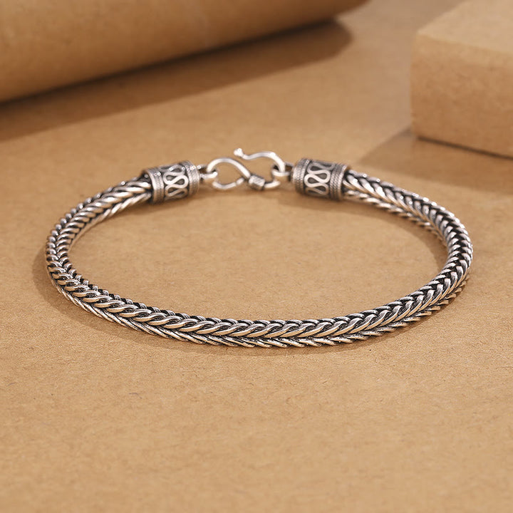 Pulsera con hebilla de riqueza con diseño trenzado y quilla de dragón vintage con Buddha Stones