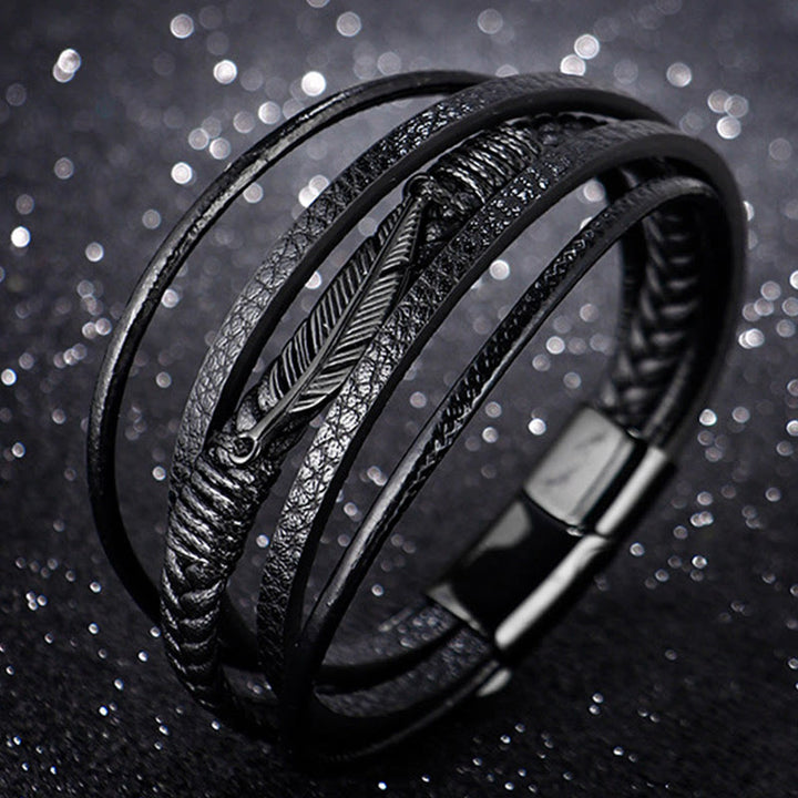 Pulsera con hebilla magnética trenzada de acero titanio y cuero multicapa con diseño de plumas de Buddha Stones
