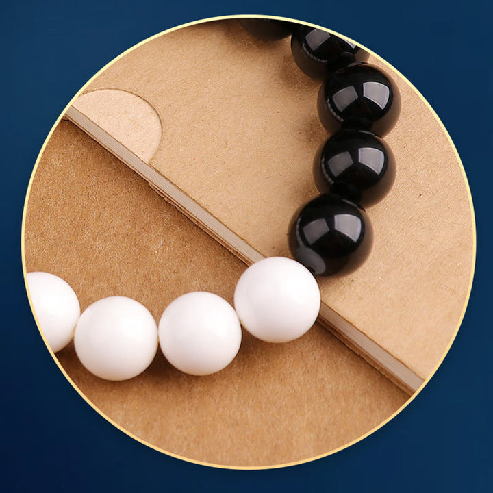 Pulsera de fuerza Yin Yang de concha blanca de obsidiana negra de plata de ley 925 con Buddha Stones