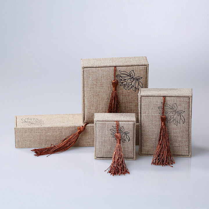 Caja de almacenamiento de joyería con diseño de loto y Buddha Stones, caja de regalo con borlas