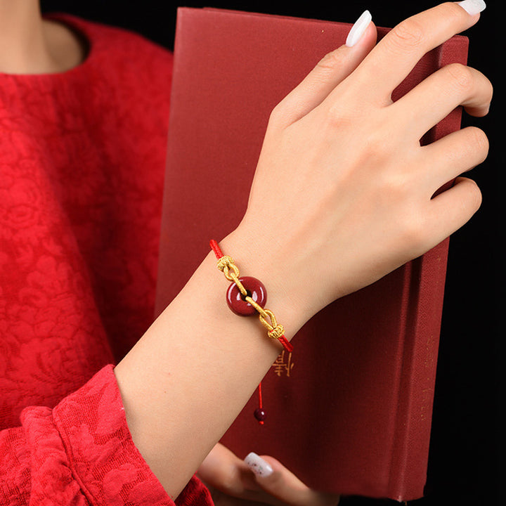 Pulsera de cuerda trenzada con hebilla de paz de cinabrio hecha a mano con Buddha Stones