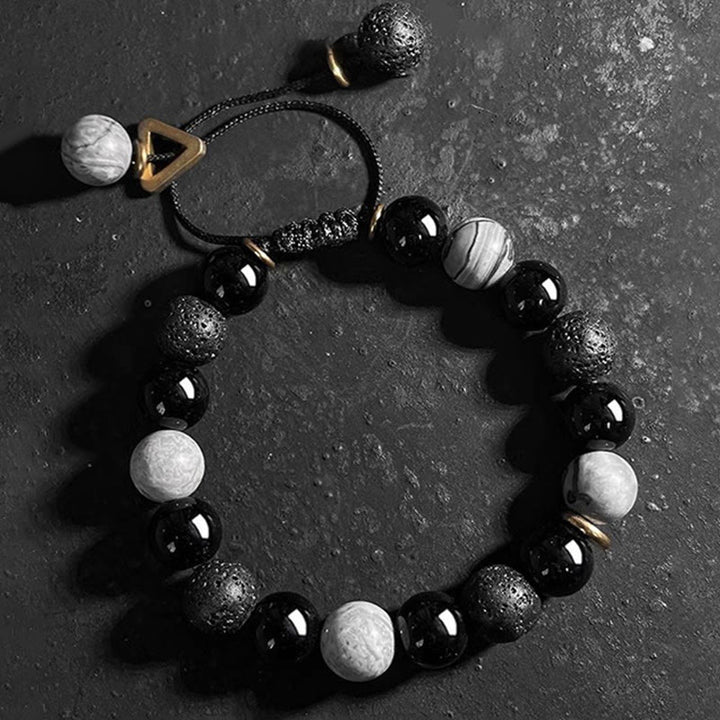 Pulsera de fuerza Yin Yang de piedra de roca de lava de obsidiana negra con Buddha Stones