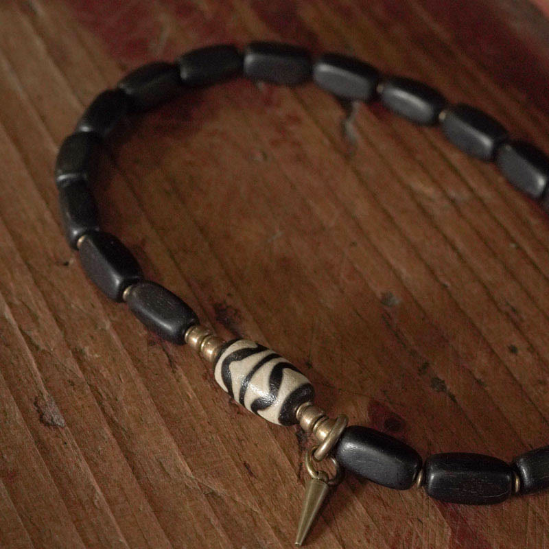 Pulsera de doble envoltura con cuentas Dzi de madera de ébano del Tíbet con Buddha Stones