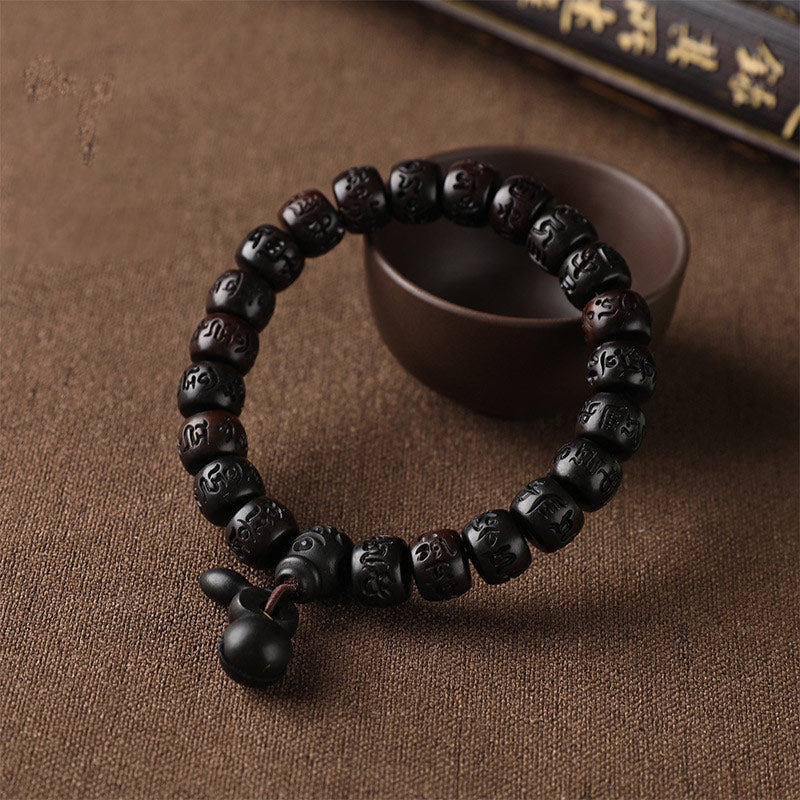 Pulsera de protección de madera con relámpago tibetano de Buddha Stones