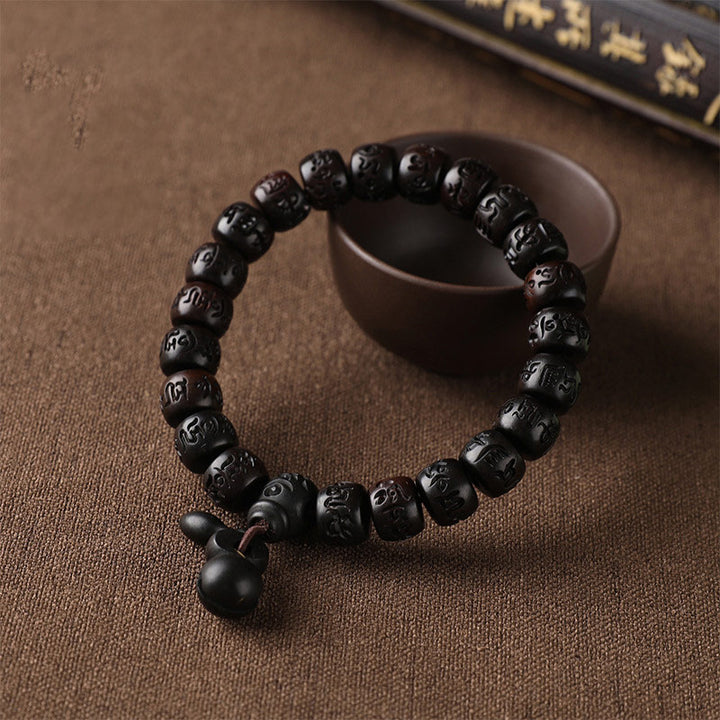Pulsera de protección de madera con relámpago tibetano de Buddha Stones