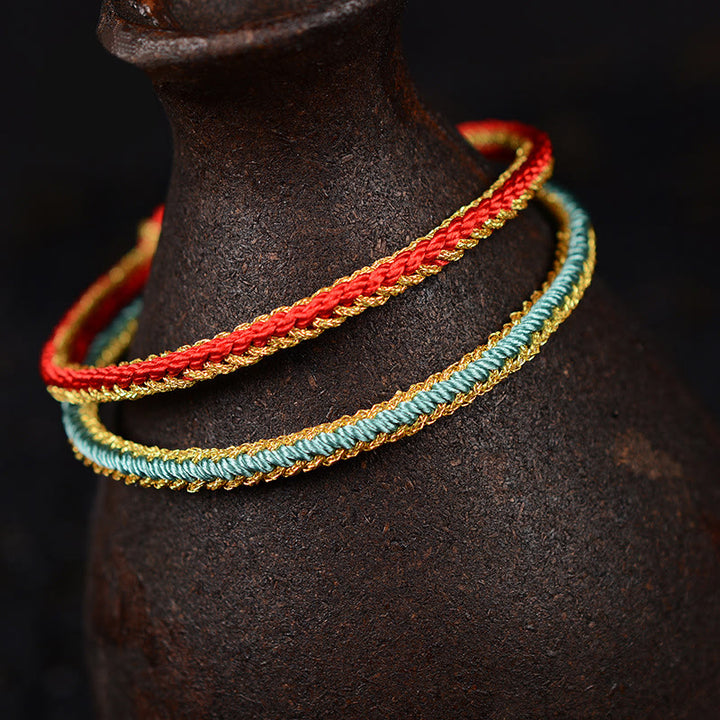 Pulsera de nudo de paz de ocho hilos hecha a mano con cuerda bicolor de Buddha Stones