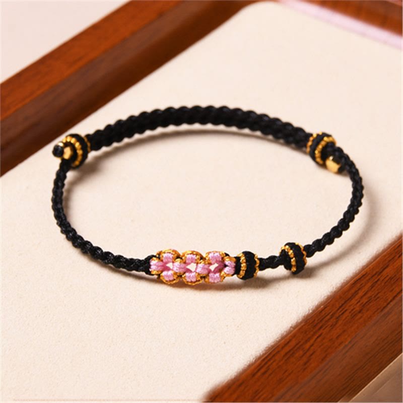 Pulsera de cuerda trenzada con protección de flor de melocotón hecha a mano con Buddha Stones