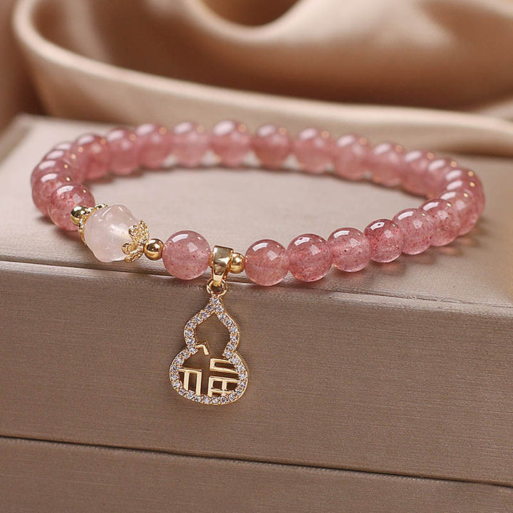 Pulsera positiva con dije de personaje Fu de calabaza de cuarzo fresa con Buddha Stones