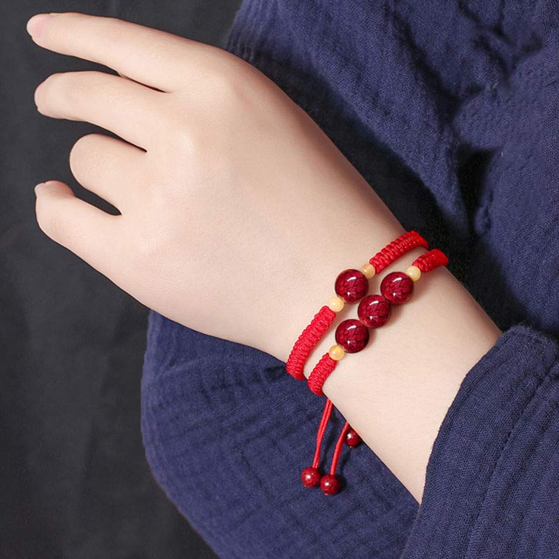 Pulsera de hilo rojo con bendición de cinabrio de Buddha Stones para niños