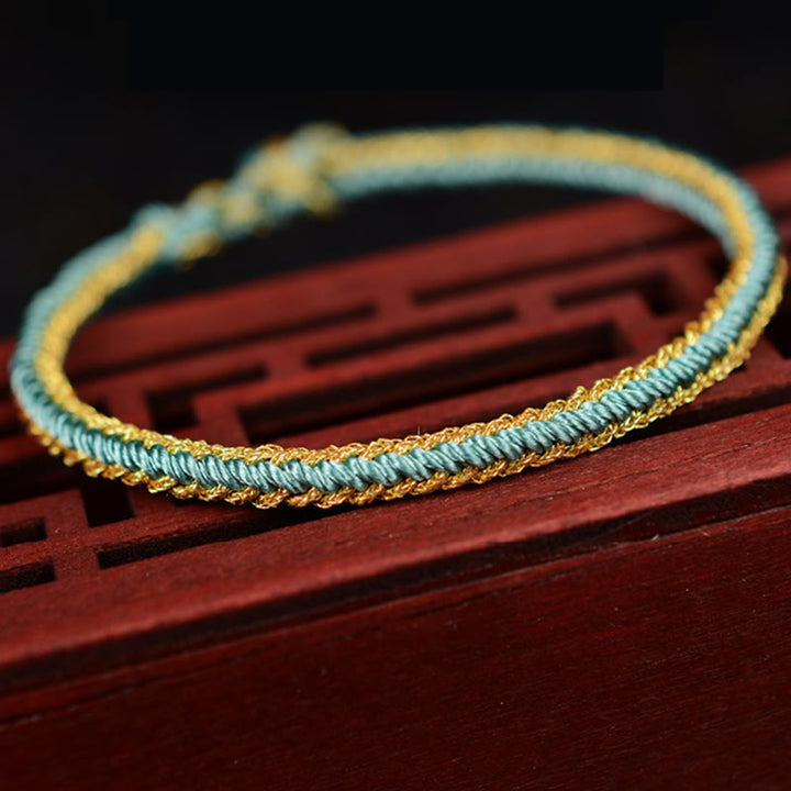 Pulsera de nudo de paz de ocho hilos hecha a mano con cuerda bicolor de Buddha Stones