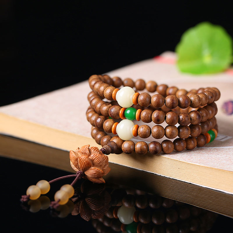 Buddha Stones 108 cuentas Mala madera de melocotón semilla Bodhi pulsera de meditación de oración de loto