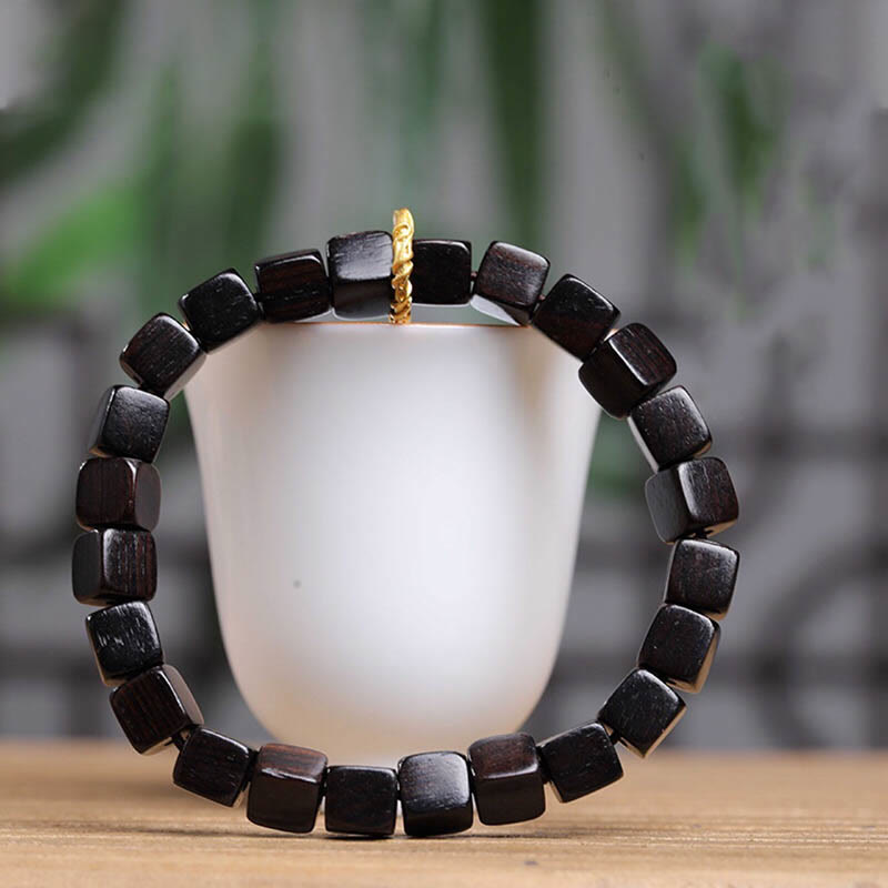 Pulsera de paz y calma con cuentas cuadradas de madera de ébano tibetano con Buddha Stones