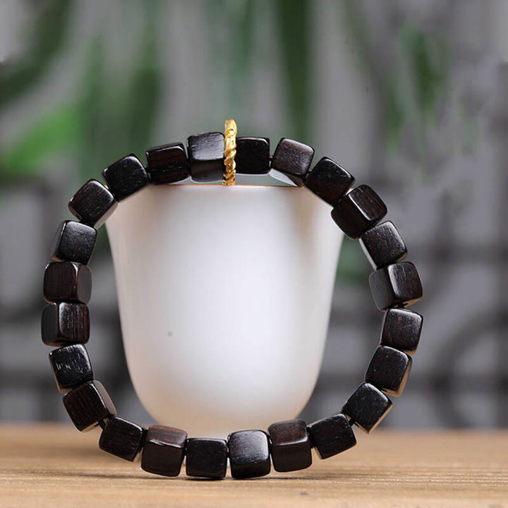 Pulsera de paz y calma con cuentas cuadradas de madera de ébano tibetano con Buddha Stones