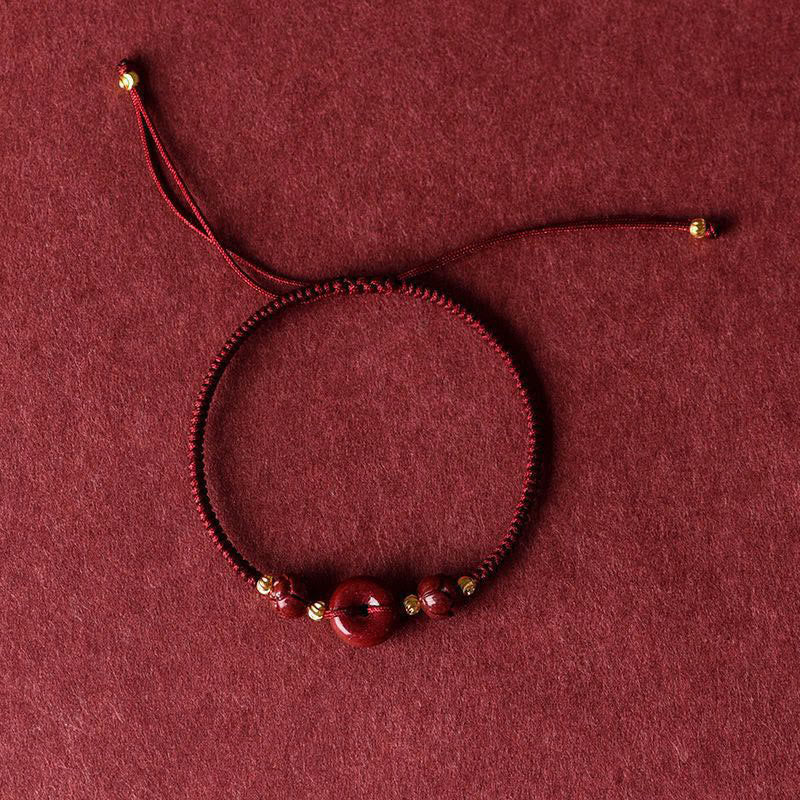 Pulsera trenzada de bendición con hebilla de paz y cinabrio de loto hecha a mano con Buddha Stones