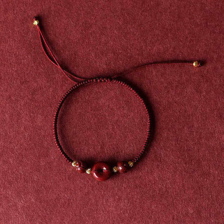 Pulsera trenzada de bendición con hebilla de paz y cinabrio de loto hecha a mano con Buddha Stones