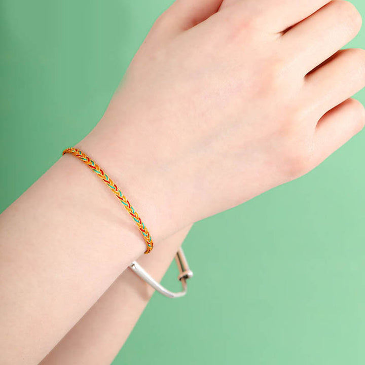 Pulsera de hilo trenzado con diseño de escamas de dragón multicolor hecha a mano con Buddha Stones