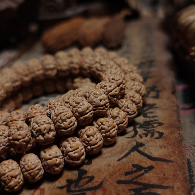 108 cuentas de Mala Rudraksha Bodhi Semilla Suerte Riqueza Borla Pulsera cuádruple