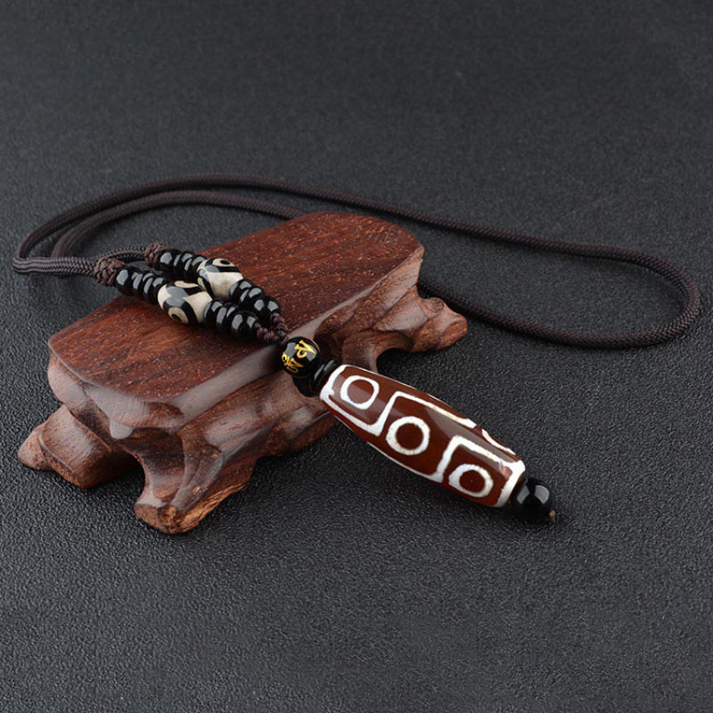 Collar de protección de la riqueza con cuentas Dzi de nueve ojos y Buddha Stones