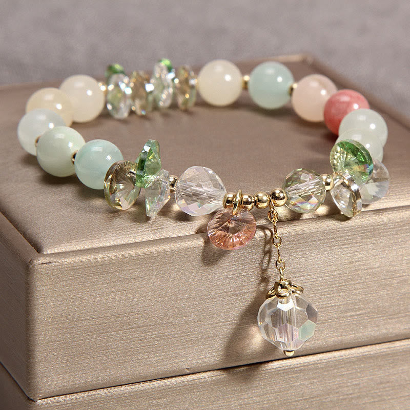 Pulsera con dije de paz y cristal rosa con ojo de gato y Buddha Stones