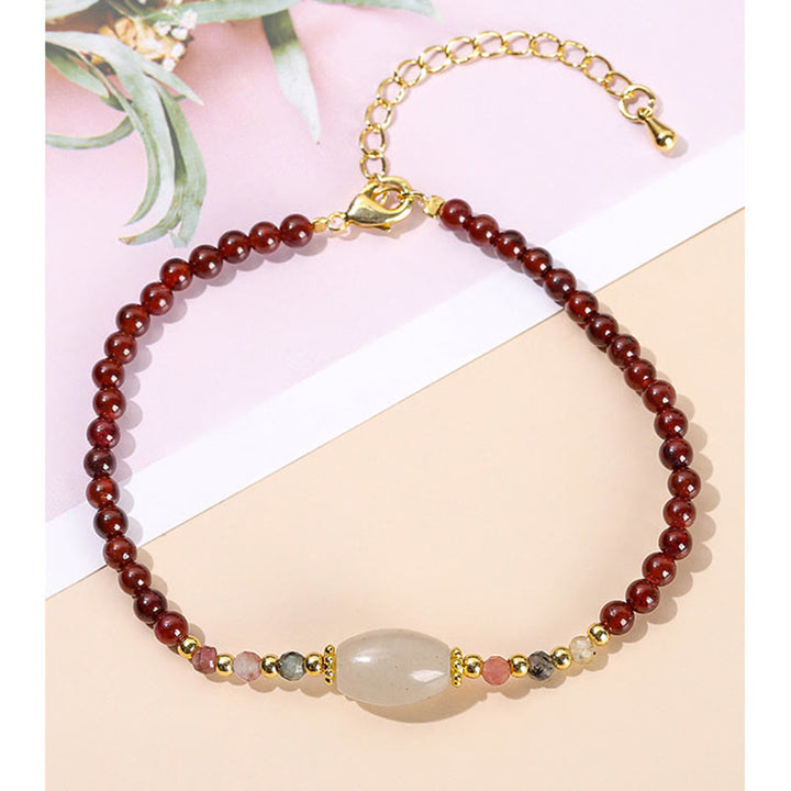 Pulsera Pasión con Cuentas de Turmalina y Jade Granate con Buddha Stones