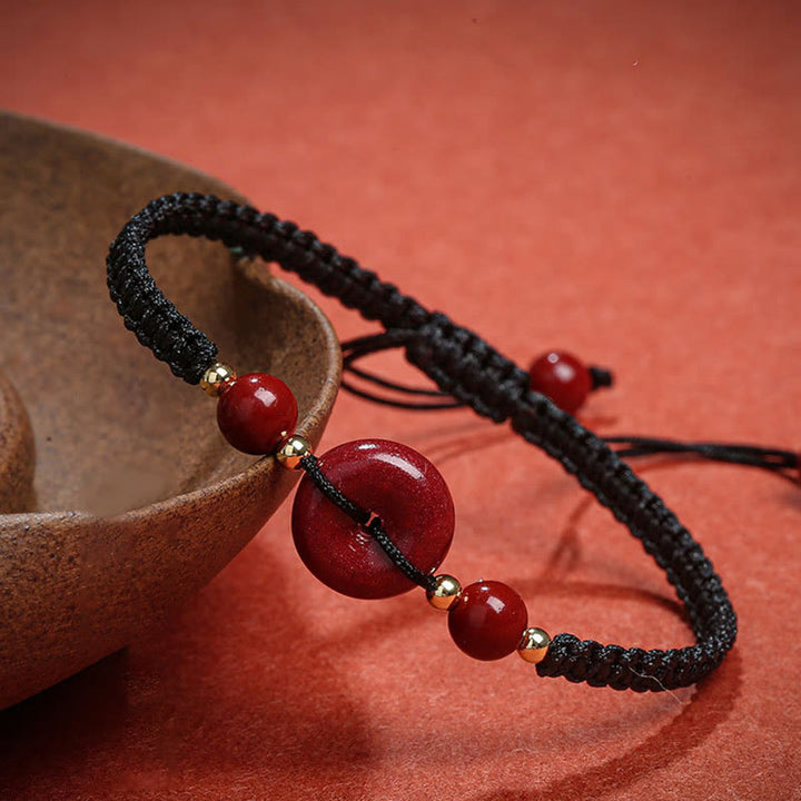 Pulsera de cuerda de bendición con hebilla de paz de cinabrio natural con Buddha Stones
