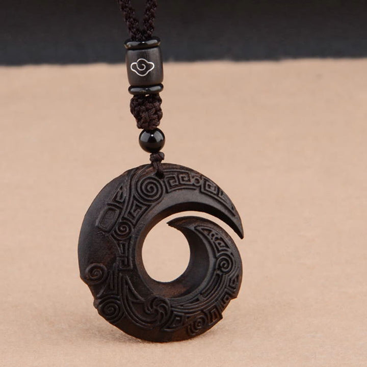 Buddha Stones, hoja pequeña, sándalo rojo, madera de ébano, la suerte mejora el diseño, colgante de collar de protección